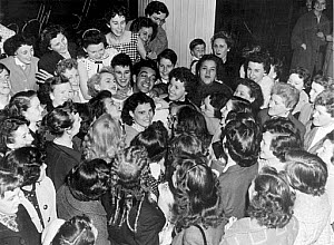 10322333
� NMeM Daily Herald Archive
Frankie Vaughan at a fan party, 12 June 1955.