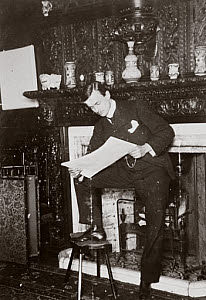 10327047
� Science Museum Archive
C S Rolls standing by a fireplace reading, c 1900.