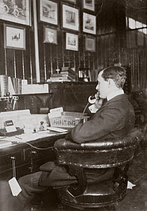 10327051
� Science Museum Archive
C S Rolls sitting at his desk talking on the telephone, c 1900.