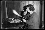 10432202
� NMeM Daily Herald Archive
Woman making glass eyes, 1935.