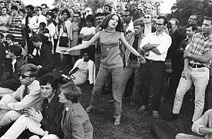 10329105
&copy; NMeM - Tony Ray-Jones
Woman dancing at a festival, Hyde Park, London, 1967.