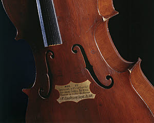10325907
&copy; Science Museum
Hand-made cello from scrap materials, WW1, 1914-1918.