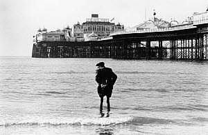 10307719
&copy; NMeM - Tony Ray-Jones
Elderly man paddling at Brighton, 1967.