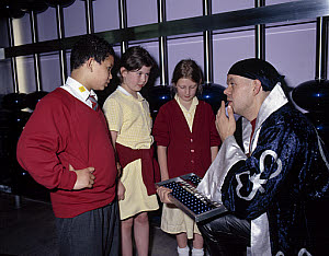 10326320
&copy; Science Museum
Children learning how an abacus works, Science Museum, London, 2001.