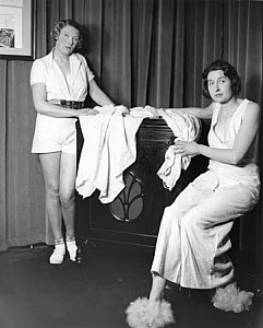 10308626
&copy; NMeM Daily Herald Archive
Posing with the latest HMV gramophone, 31 January 1933.