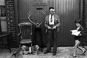 10307829
&copy; NMeM - Tony Ray-Jones
Man with antique bric-a-brac, Wormwood Scrubs, London, 1967.