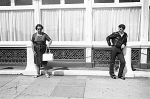 10329036
&copy; NMeM - Tony Ray-Jones
Old women with young rocker, Bath, c 1967.