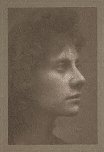 10453449
Profile of a woman, c 1900.