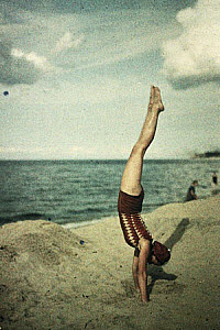 10455853
Eva doing a handstand, c 1920s.