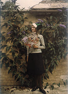 10462659
Girl with a bunch of flowers, c 1913.