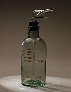 10318724
&copy; Science Museum
Bottle from blood transfusion apparatus, 1914-1918.
