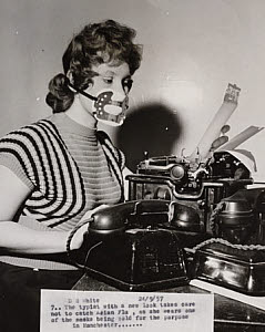 10459842
&copy; NMeM Daily Herald Archive
'A typist wears a mask to protect against Asian flu', 24 Sept 1957.
