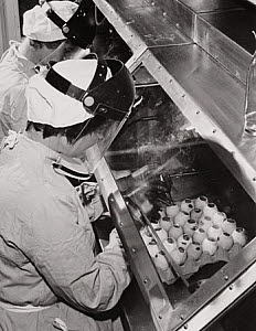 10459843
&copy; NMeM Daily Herald Archive
Manufacturing anti-flu vaccine, 19 February 1962.