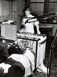 10250359
&copy; NMeM Daily Herald Archive
Monitoring on a brainwave machine, 24 April 1950.