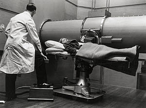 10250375
&copy; NMeM Daily Herald Archive
An x-ray being taken at Bartholomew's Hospital in London, c 1930s.