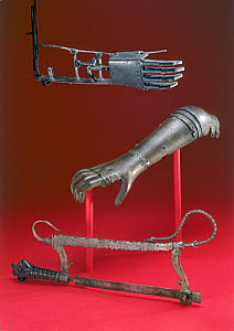 10287283
&copy; Science Museum
Amputation saw and two artificial arms, 16th century.