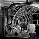 10414520
&copy; NMeM - Walter Nurnberg
Secretary with pneumatic tube communications, Hull, 1954.