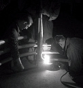 10414918
&copy; NMeM - Walter Nurnberg
Three men welding a hirca tube, Talbot Stead Tubes, Walsall, 1948.