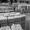 10414947
&copy; NMeM - Walter Nurnberg
Storeman with large stock of finished aluminium ingots, Handsworth, 1961.