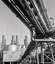 10414967
&copy; NMeM - Walter Nurnberg
Long rows of pipes and chimneys at Bradley Mill, British Titan Products, 1964.