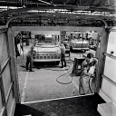 10415083
&copy; NMeM - Walter Nurnberg
Fitters work on transit van assembly, Strachan , Hamble, 1969.