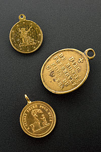 10546106
&copy; Science Museum
Brass amulet to protect the wearer from cholera, France, 1820-1880