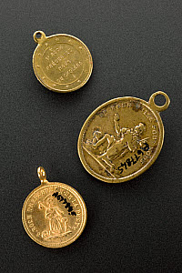 10546107
&copy; Science Museum
Brass amulet to protect the wearer from cholera, France, 1820-1881