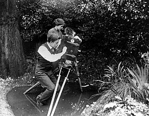 10324606
&copy; Science Museum
F Percy Smith, English filmmaking pioneer, filming in a pond, c 1910.