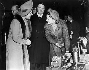 10307109
&copy; National Railway Museum
Queen Elizabeth with a munitions worker, 1941.