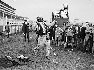 10441025
&copy; NMeM Daily Herald Archive
Prince Monolulu the tipster at work, Epsom Races, Surrey, 28 May 1933.