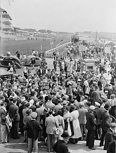 10441026
&copy; NMeM Daily Herald Archive
Prince Monolulu the tipster at work, Epsom Races, Surrey, 30 May 1937.