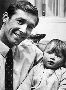 10315335
&copy; Manchester Daily Express
Alex Ferguson with his one year old son, Mark, November 1969.