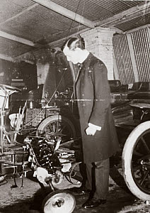 10327040
&copy; Science Museum Archive
C S Rolls looking at the engine of a motor car in his garage, c 1900.