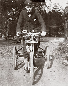 10326956
&copy; Science Museum Archive
C S Rolls sitting on a de Dion tricycle, Cambridge, 1897.