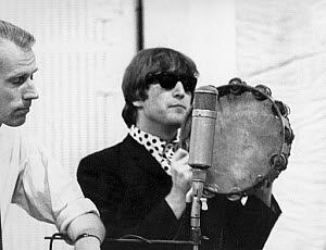 10296160
Beatle John Lennon with record producer George Martin, 2 October 1964.