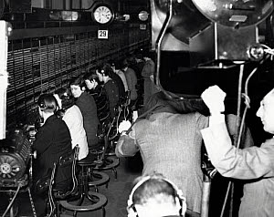 10308932
Televising the telephone board at Faraday House in London, 29 January 1939.