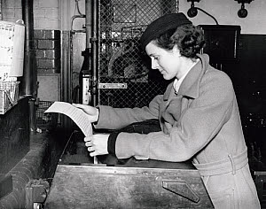 10308895
Mrs Ben Foord in the Daily Herald office, 1938.