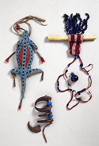 10309009
&copy; Science Museum
Two necklaces and an amulet, USA and Alaska, c 1850-1920.