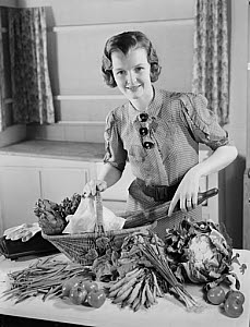 10429129
© NMPFT - Photographic Advertising
Woman in a kitchen with a basket of vegetables, c 1950. 10429129
© NMPFT - Photographic Advertising
Woman in a kitchen with a basket of vegetables, c 1950.