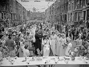 10447029
&copy; NMeM Daily Herald Archive
Coronation party street scene, London, 1953.