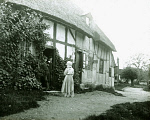 10465229
&copy; John Martin
People at a cottage door, c 1910-1915.