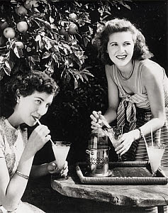 10327134
Two young women enjoying a summer drink, 1945-1955.