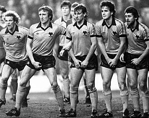 10466439
&copy; Manchester Daily Express
Wolverhampton Wanderers guard against a Liverpool free kick, 1980s.