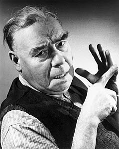 10327140
Elderly man counting on his fingers, c 1940s.
