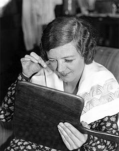 10320842
&copy; NMeM Daily Herald Archive
Woman trying on false eyelashes, Harrods, London, 4 September 1931.