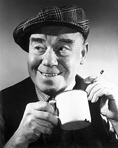 10327142
Man having a cup of tea and a cigarette, c 1940s.