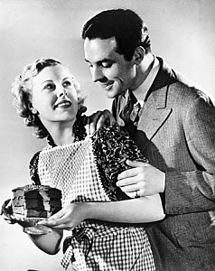 10327143
Couple with a cake, late 1930s.
