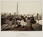 10446848
&copy; National Railway Museum
Steam locomotive on bridge, St Pancras burial ground, London, 2 July 1867.