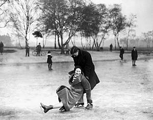 10321451
&copy; NMeM Daily Herald Archive
Woman slipping on the ice, Wimbledon, London, 27 January 1932.