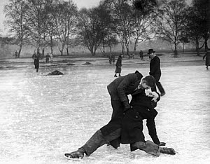 10321452
&copy; NMeM Daily Herald Archive
Skaters falling over on the ice, Wimbledon, London, 27 January 1932.